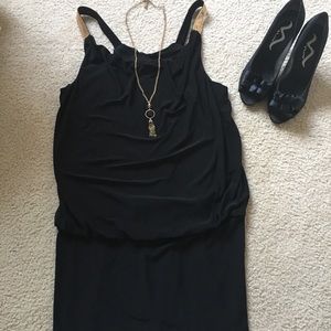 Black dress with gold accented straps